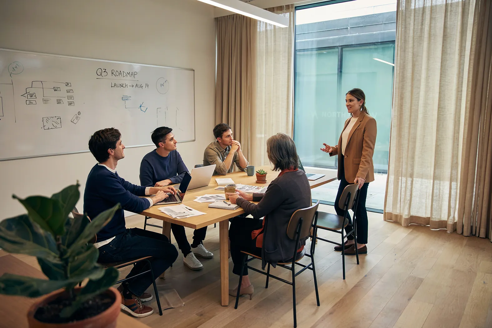 A team meeting conducted in English